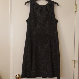 Fit and flare black cocktail dress.